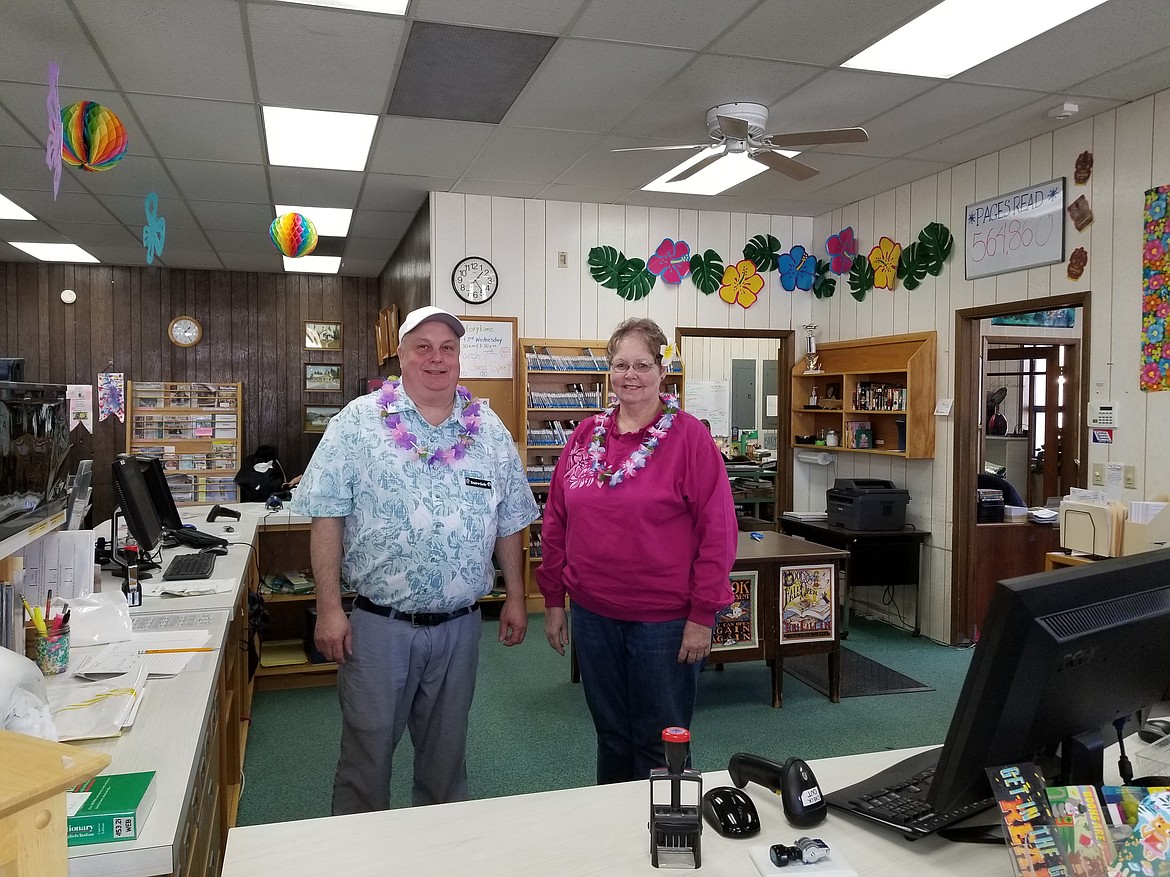 Photo by Mandi Bateman
Derrick Grow and Dianna Zills are ready to hit the beach during Hawaiian days at the Boundary County Public Library.