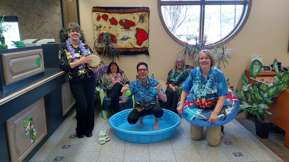 Courtesy photo
The employees at Columbia Bank weren&#146;t afraid to get their feet wet!