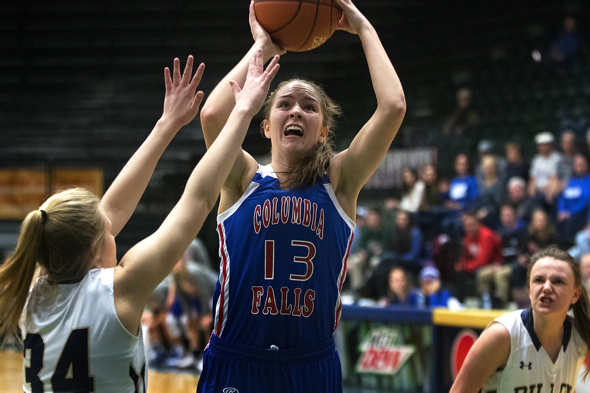 Senior Hannah Gedlaman goes up for a shot against Dillon at the Western A Divisional Tournament. Gedlaman helped lead the Kats to a third-place finish at state over the weekend. (Jeremy Weber photo)