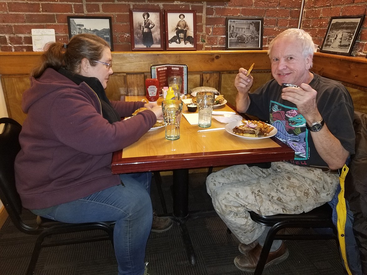 Photo by Mandi Bateman
Mugsy&#146;s Tavern and Grill owner Danielle Reasoner surprised Kathy and Larry Humberg with lunch for them.