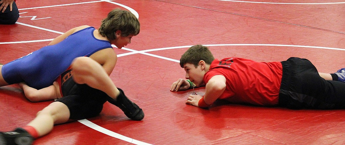 Cat Cameron Anderson pins his opponent in Novice, 85 pound, during Little Guy Wrestling in Superior on March 10. (Kathleen Woodford/Mineral Independent).