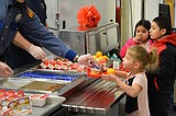 First responders serve school breakfast