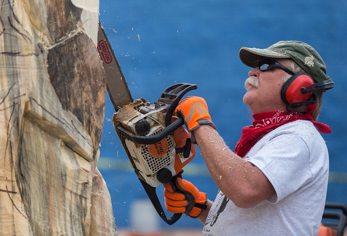 Ron Adamson competes in the Kootenai Country Montana Chainsaw Carving Championship on Sept. 15, 2017. (John Blodgett/The Western News file photo)
