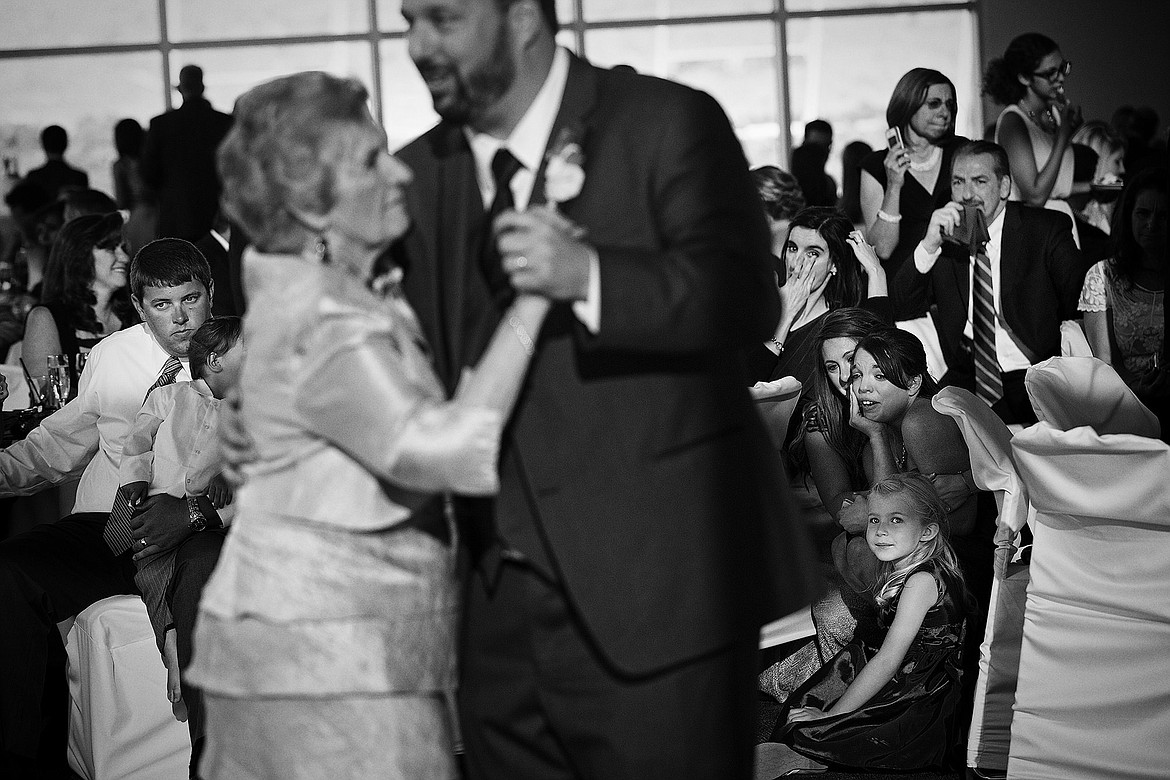 Photo by JEROME POLLOS PHOTOGRAPHY
Brian Mandato dances with his grandmother which prompted a flood of emotions for friends and family because Mandato&#146;s mother had passed away before the wedding held Saturday, June 28, 2014, in Meridian, Idaho.
