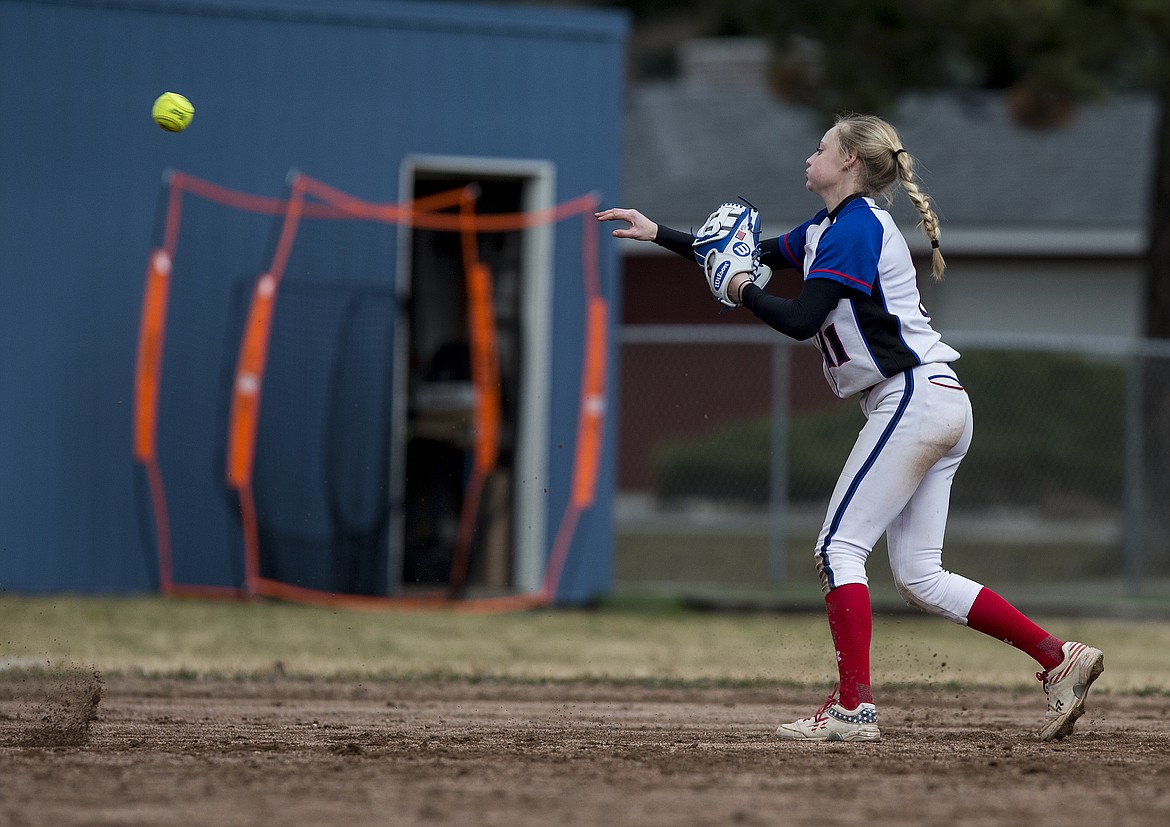 Coeur d&#146;Alene shortstop Madison Fernimen throws to third base to get the lead runner during Wednesday&#146;s game against West Valley.