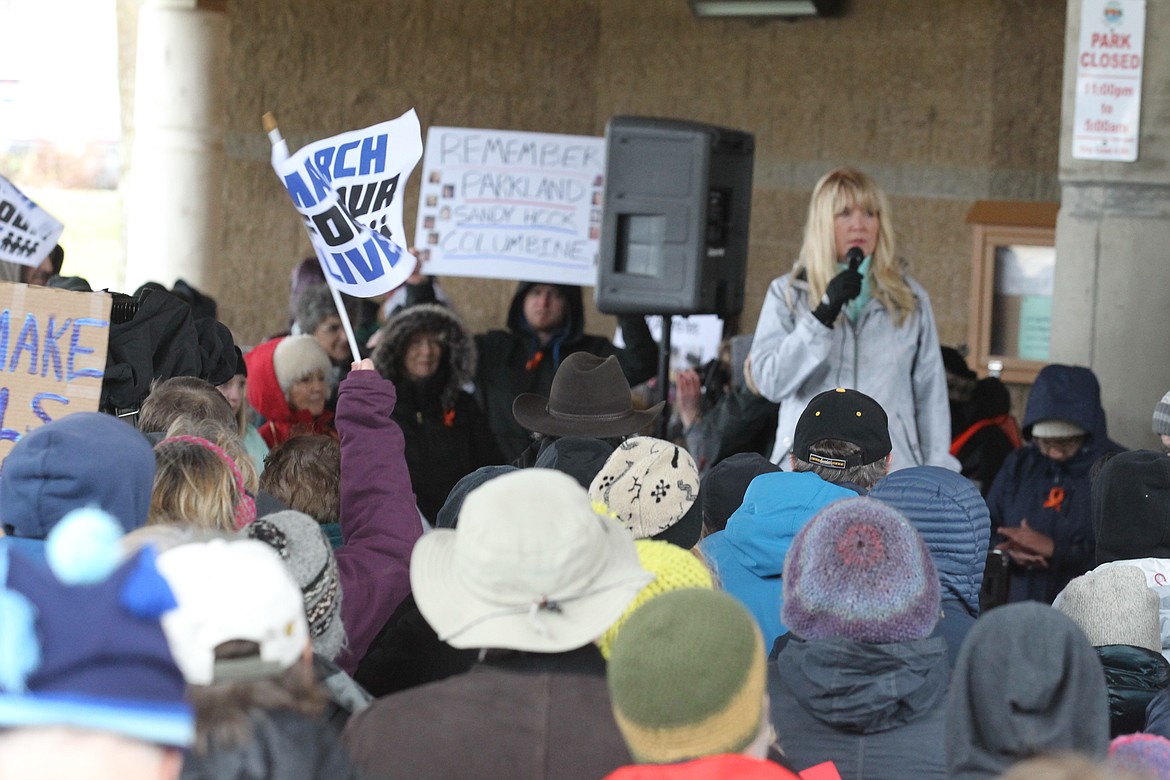 Kootenai County Task Force on Human Relations president Christie Wood addresses the crowd Saturday morning in the McEuen Park pavilion during Coeur d'Alene's March for Our Lives. At least 450 people turned out for the march, which was held in conjunction with about 850 &quot;sibling&quot; events worldwide. (DEVIN WEEKS/Press)