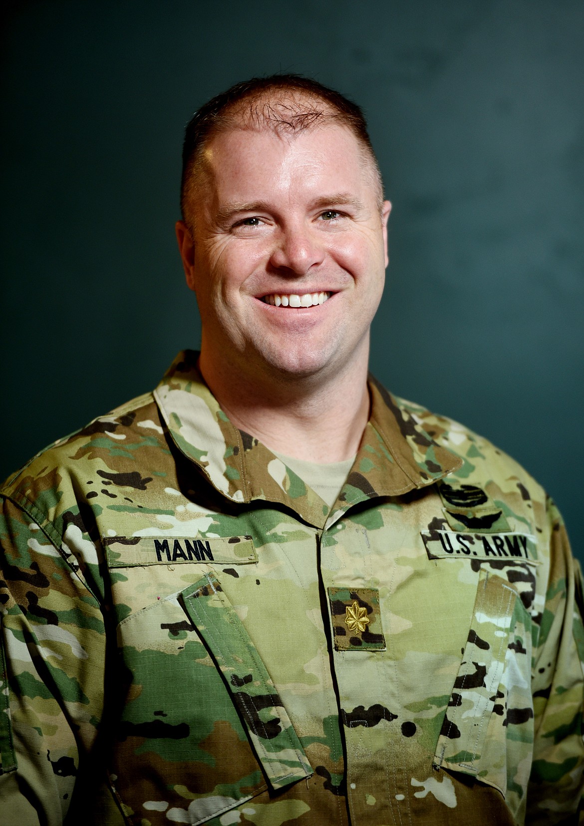 Major Jesse Mann in his office at Edward Jones in Columbia Falls on Wednesday, March 21. Mann, a combat veteran, now helps students make decisions about military service as a liaison for West Point Academy.
(Brenda Ahearn/Daily Inter Lake)