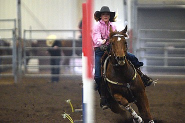 Brooke Wilson, of Bigfork, competes in the pole bending event at the Montana High School Rodeo Association 2018 at Majestic Valley Arena in Kalispell on Friday. (Casey Kreider/Daily Inter Lake)