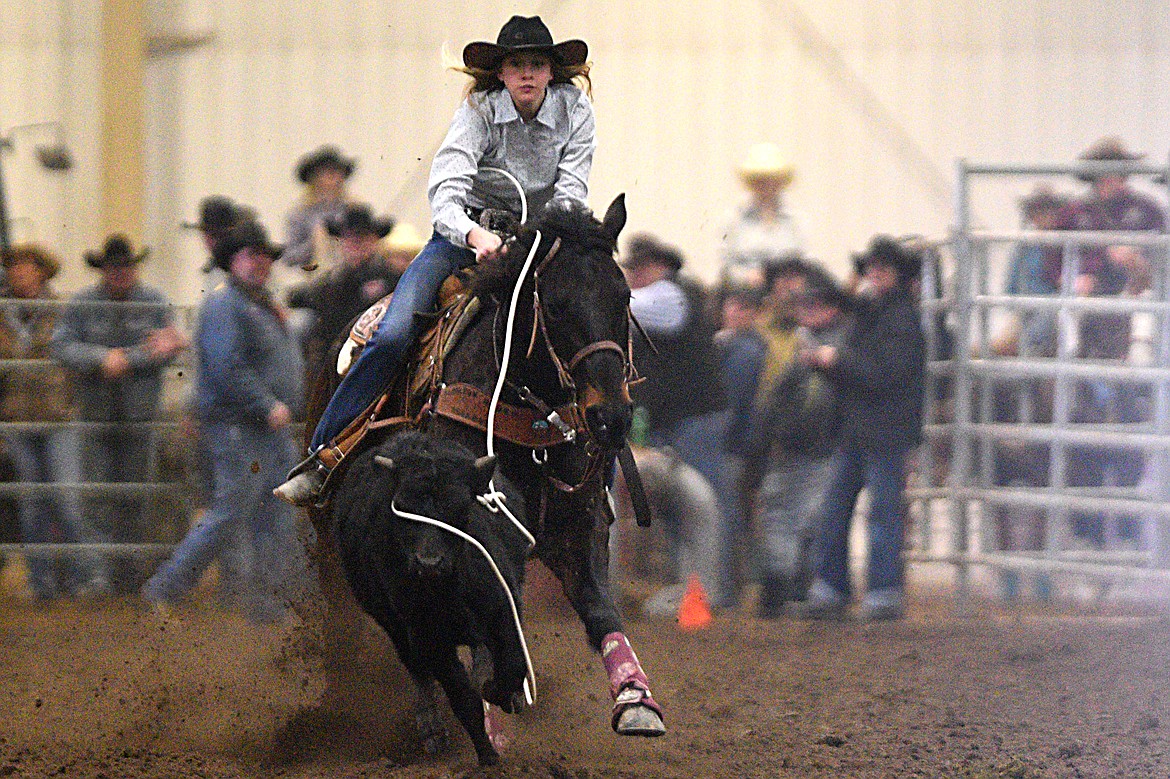 Madison McGlynn, of Helena, ropes a calf during the breakaway event at the Montana High School Rodeo Association 2018 at Majestic Valley Arena in Kalispell on Friday. (Casey Kreider/Daily Inter Lake)