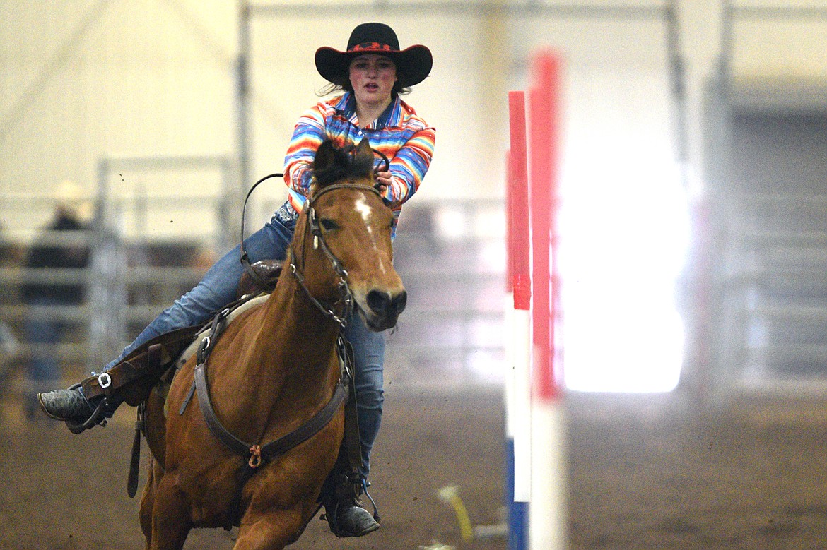 Harley May, of Kalispell, competes in the pole bending event at the Montana High School Rodeo Association 2018 at Majestic Valley Arena in Kalispell on Friday. (Casey Kreider/Daily Inter Lake)