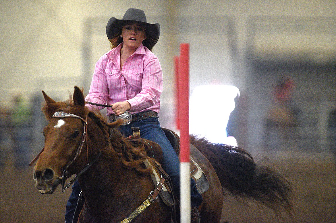 Brooke Wilson, of Bigfork, competes in the pole bending event at the Montana High School Rodeo Association 2018 at Majestic Valley Arena in Kalispell on Friday. (Casey Kreider/Daily Inter Lake)