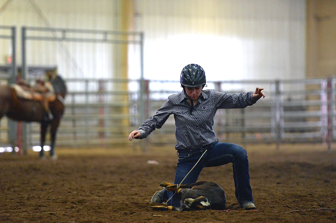 Hailey Weible, of Charlo, competes in the goat tying event at the Montana High School Rodeo Association 2018 at Majestic Valley Arena in Kalispell on Friday. (Casey Kreider/Daily Inter Lake)