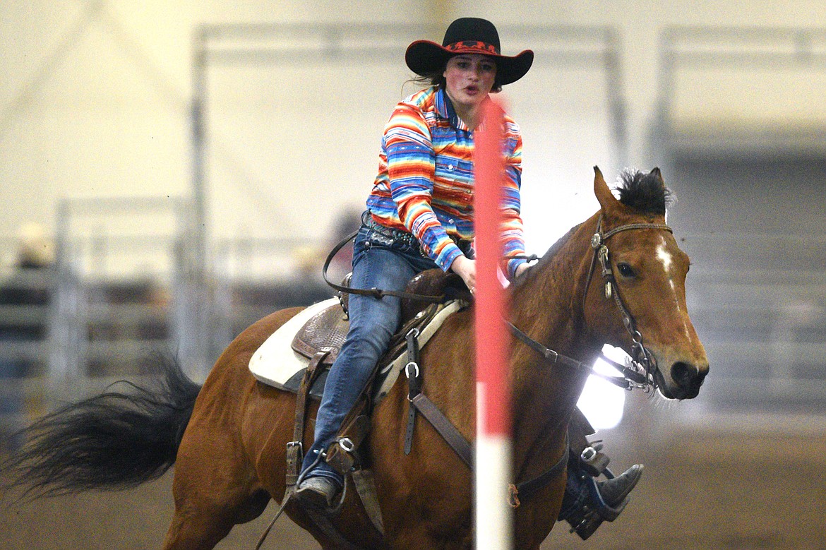 Harley May, of Kalispell, competes in the pole bending event at the Montana High School Rodeo Association 2018 at Majestic Valley Arena in Kalispell on Friday. (Casey Kreider/Daily Inter Lake)