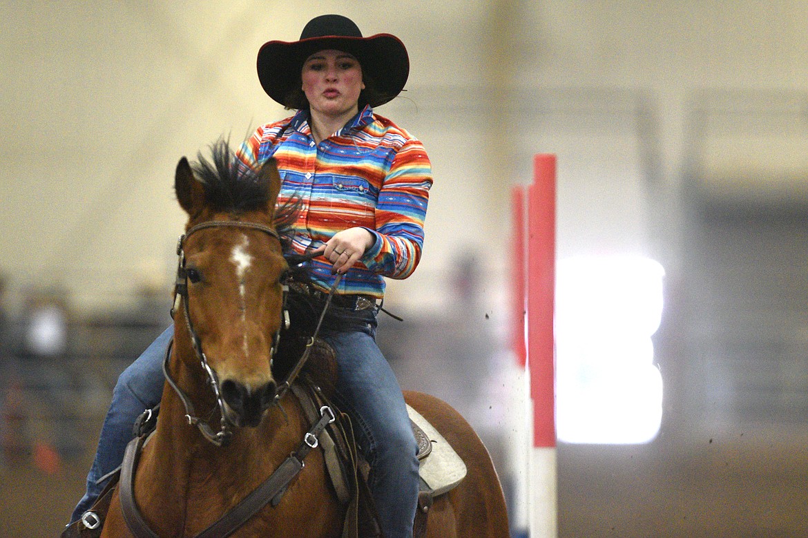 Harley May, of Kalispell, competes in the pole bending event at the Montana High School Rodeo Association 2018 at Majestic Valley Arena in Kalispell on Friday. (Casey Kreider/Daily Inter Lake)