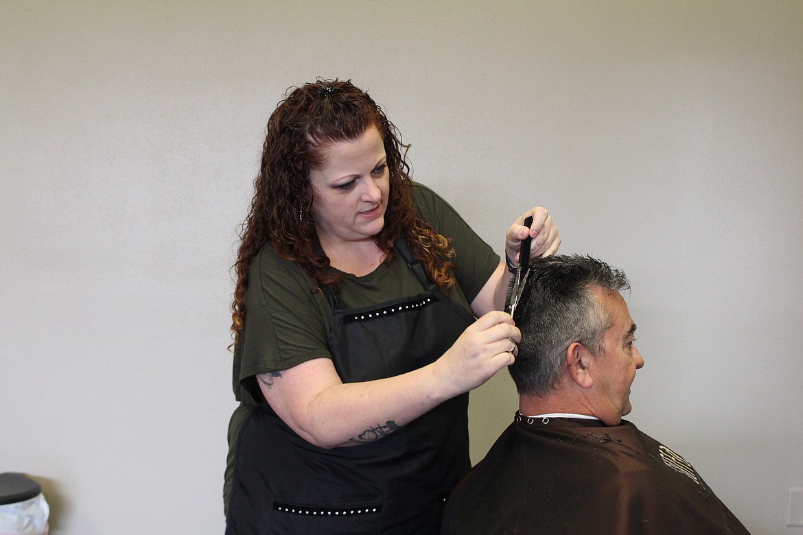 Cheryl Schweizer/Columbia Basin Herald
Salon Envy owner Heather Kerekffy (pictured) and her staff have bounced back from a fire that destroyed the old location.