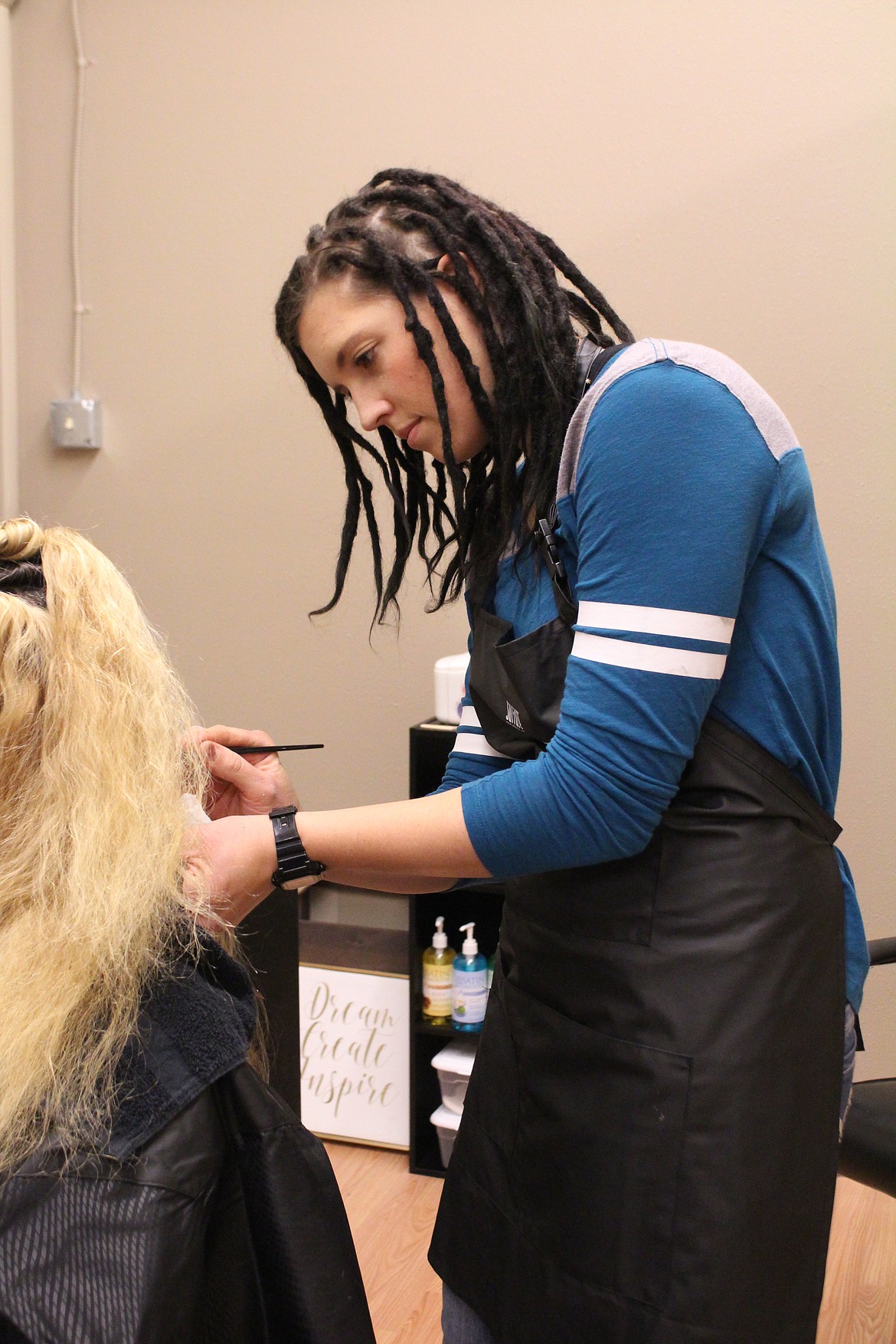 Cheryl Schweizer/Columbia Basin Herald
The old Salon Envy was destroyed by fire, but that didn&#146;t stop the staff, including Jayci Wahl (pictured), from moving on &#8211; in their case, to a bigger space.