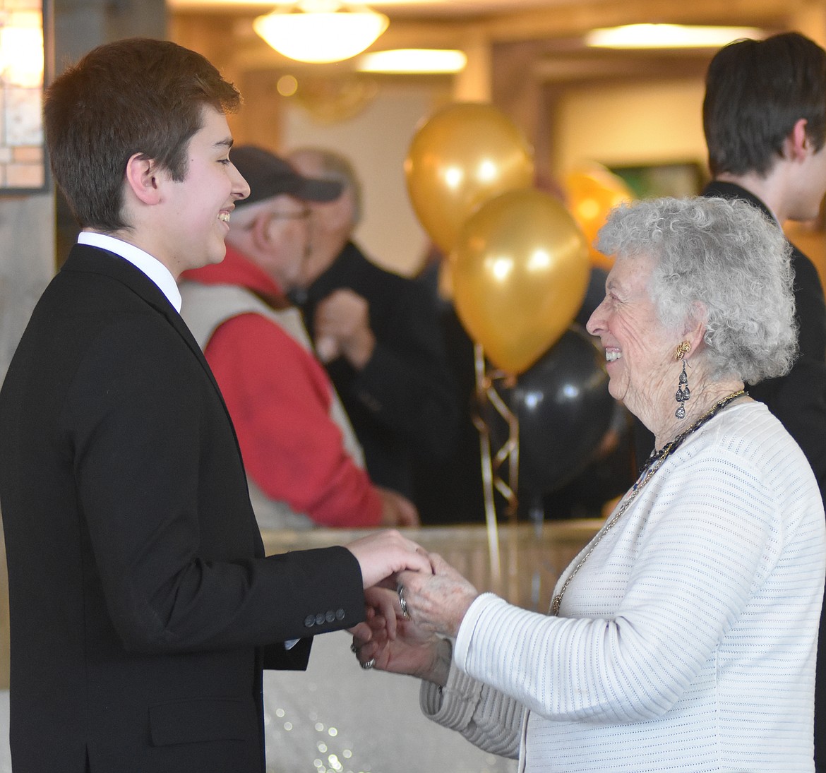 Whitefish High School student Matthew Perez dances with Faye Oberlitner Wednesday evening during the annual Senior Prom at The Springs at Whitefish. Whitefish Honor Society students danced with seniors to music by the Columbia Falls High School Columbians Jazz Band.