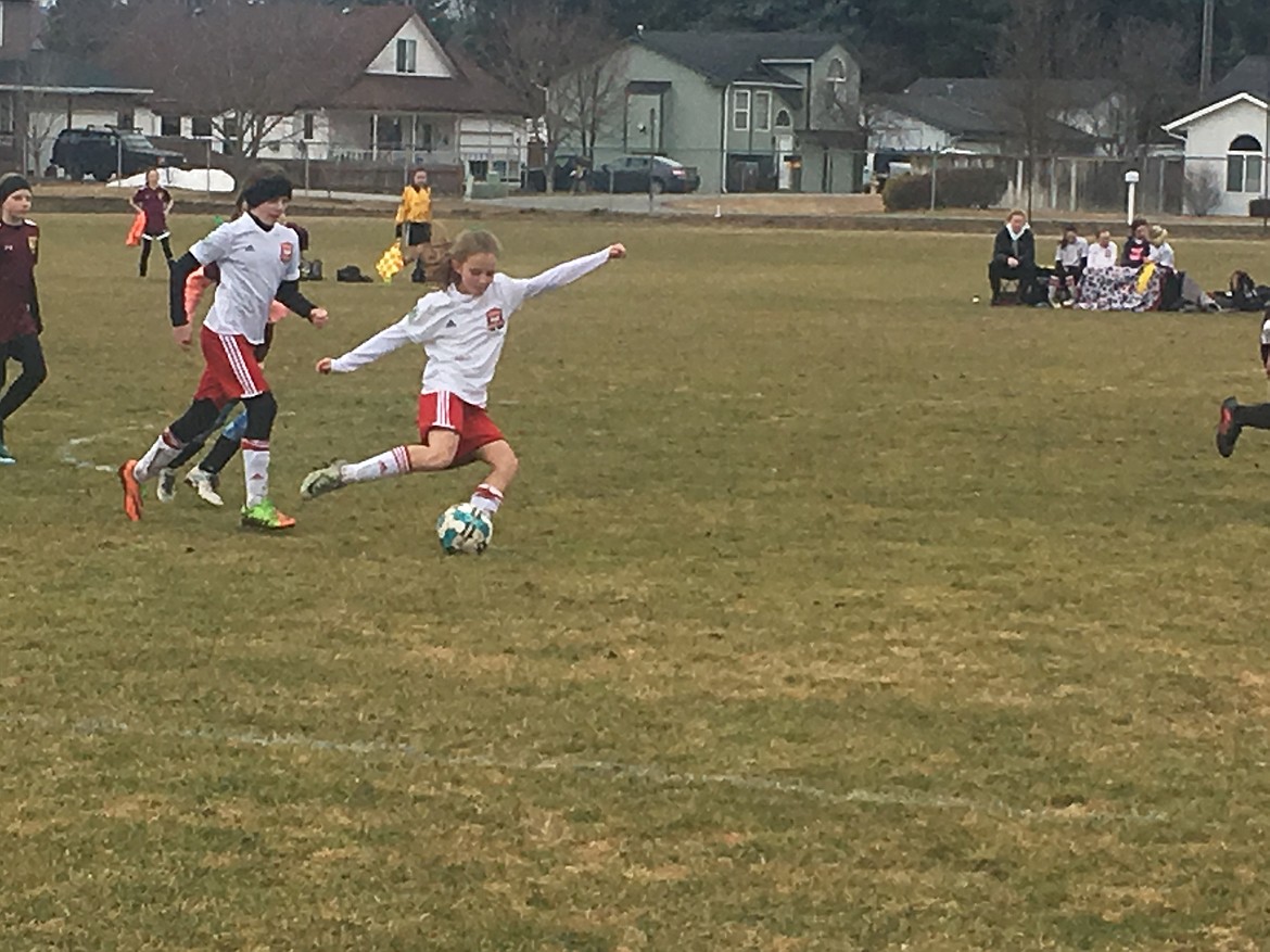 Courtesy photo
Natalie Thompson of the Sting Timbers 07 girls soccer team takes a shot on goal in Saturday's game vs. the Valor SC Maroon Sachtjen.