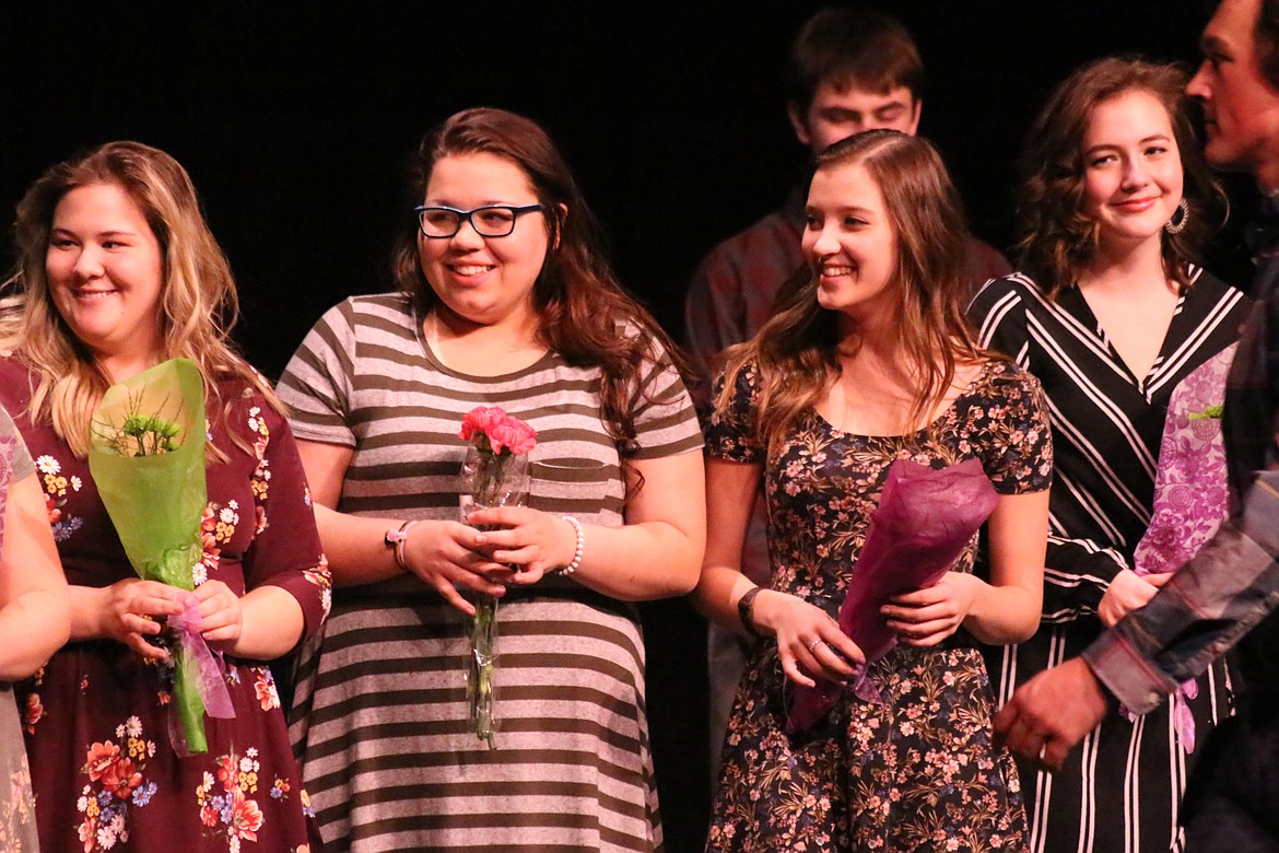 Photo by MANDI BATEMAN
The DYW Forget-Me-Nots were surprised when they were asked to come on stage and all the competitors presented them with flowers.