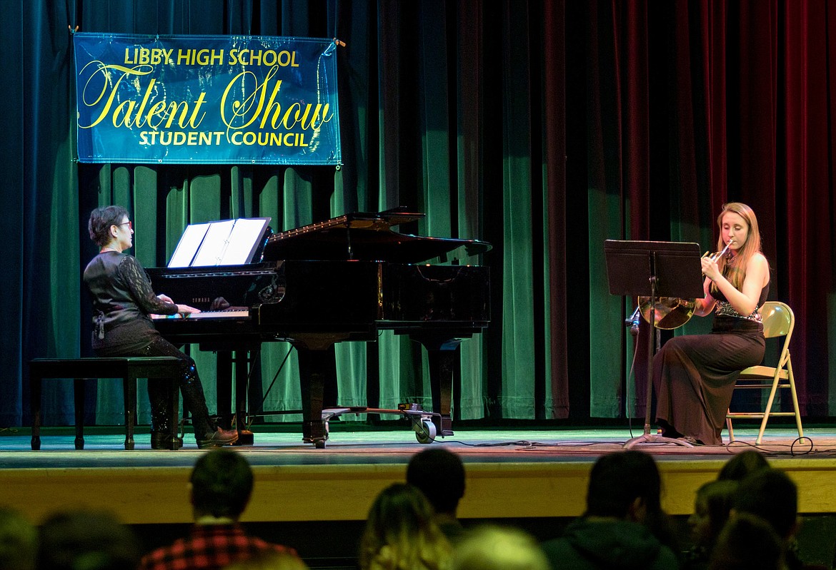 Cerria Swagger, right, accompanied by JoAnn Armstrong, performs &#147;Impressions&#148; by Norman Ward at the Libby High School Student Council&#146;s 10th Annual Talent Show Tuesday, March 20, 2018. (John Blodgett/The Western News)