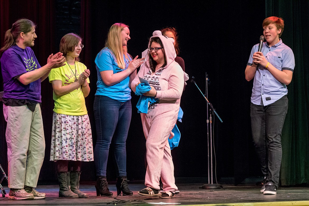 Kristel Donahue, center foreground, carries her first place prize for her performance of &#147;Despacito&#148; by Louis Fonsi and Justin Bieber. (John Blodgett/The Western News)