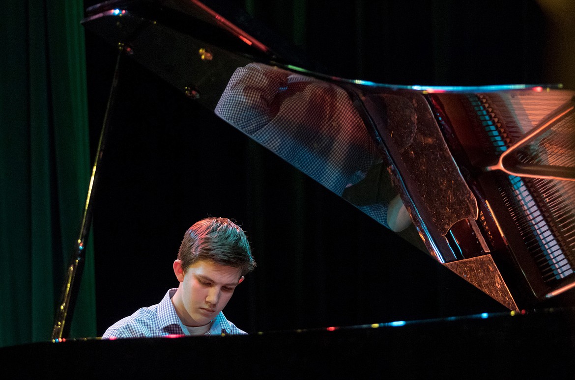 Cayman Lee plays an original piano solo. (John Blodgett/The Western News)