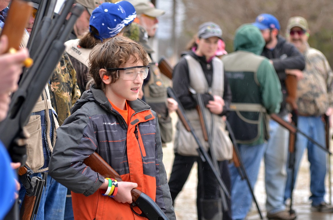 The youngest shooter at the Spring Turkey Shoot, Tyler Lyscio waits for his name to be called for the Annie Oakley.
