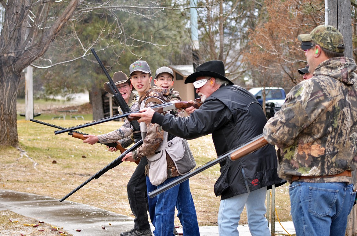 Cody Hansen, 15, Austin Hansen, 13, and Cade Stinnett, 15, realize they outshot the line-up to take the top three positions of the Annie Oakley.