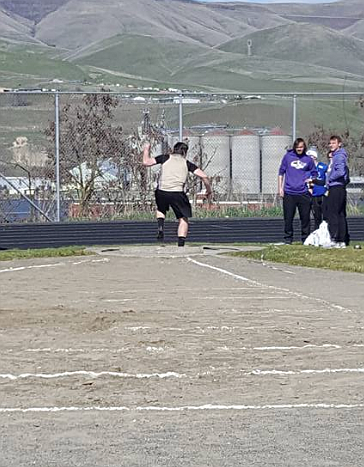 Kellogg&#146;s Jacob Hammerberg spins into his throw during a recent track meet in Lewiston. Hammerberg finished in first place at the event.