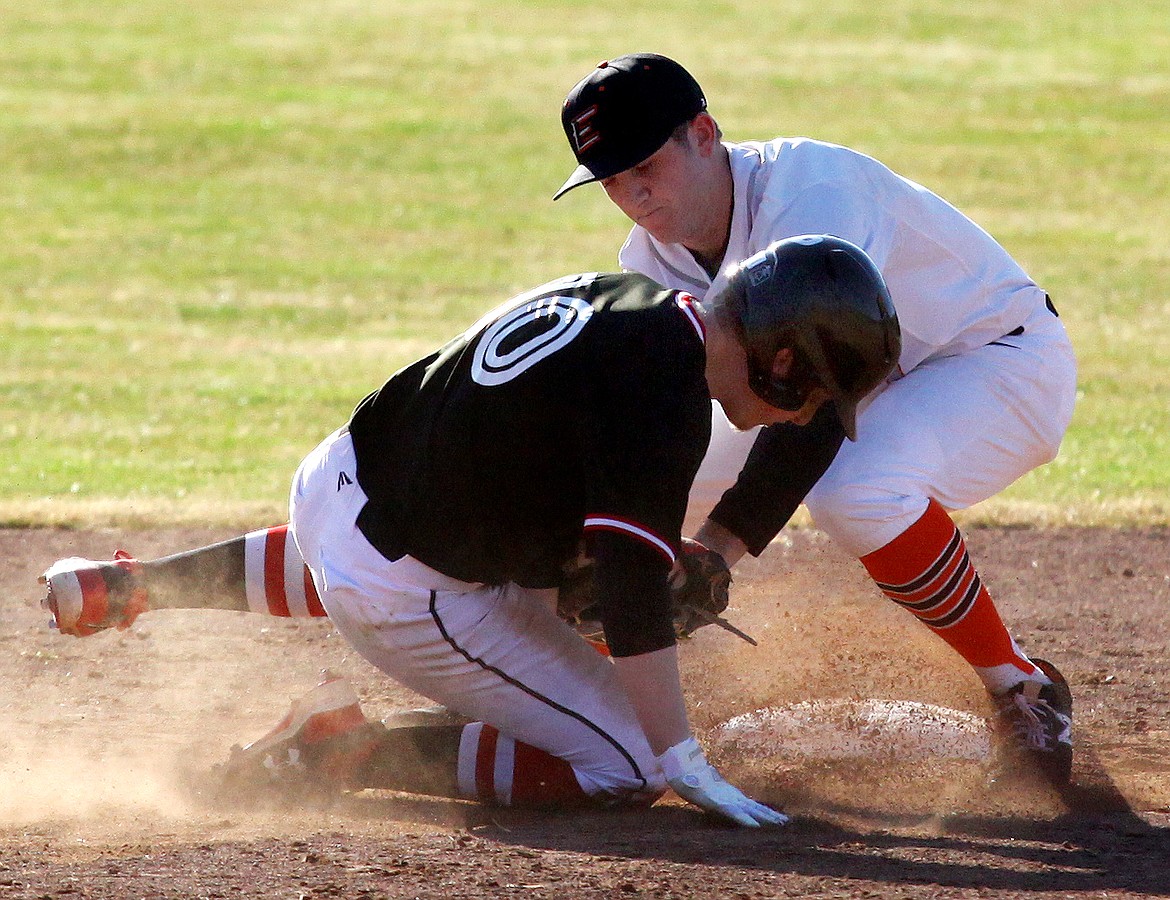 Rodney Harwood/Columbia Basin Herald
Ephrata shortstop Zac Berryman tags out Cheney runner Jacob Lauber (10) on a successful pick-off play at second base during Tuesday's non-league game at Johnson-O'Brien Stadium.