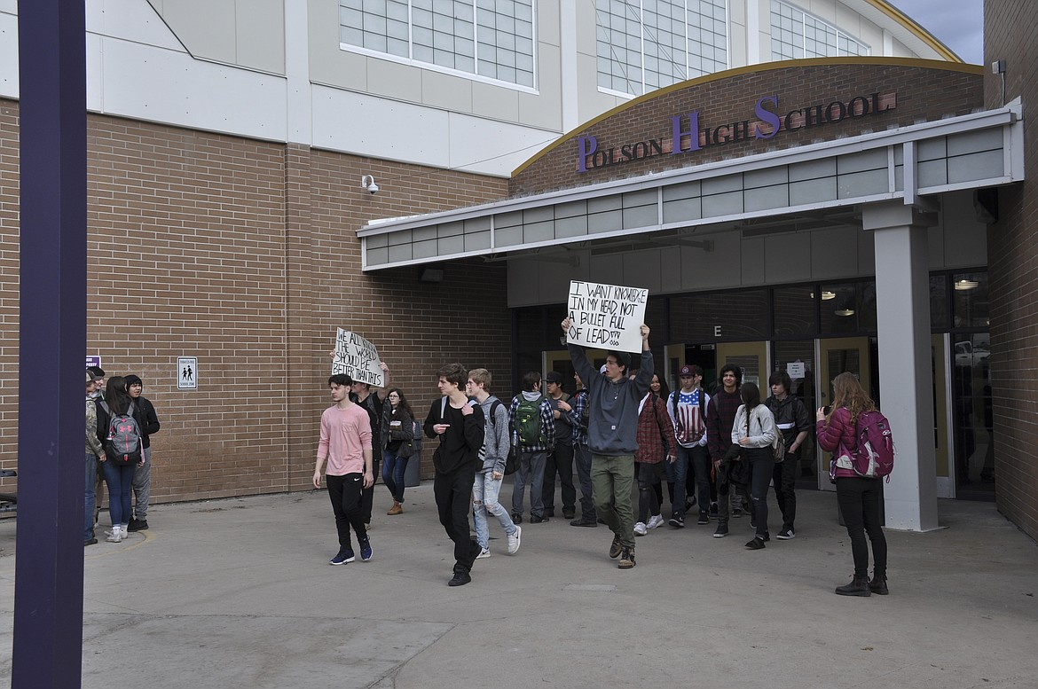 STUDENTS FROM Polson High School take part in a walk out, with which school and district administration worked to peacefully protest. (Ashley Fox/Lake County Leader)