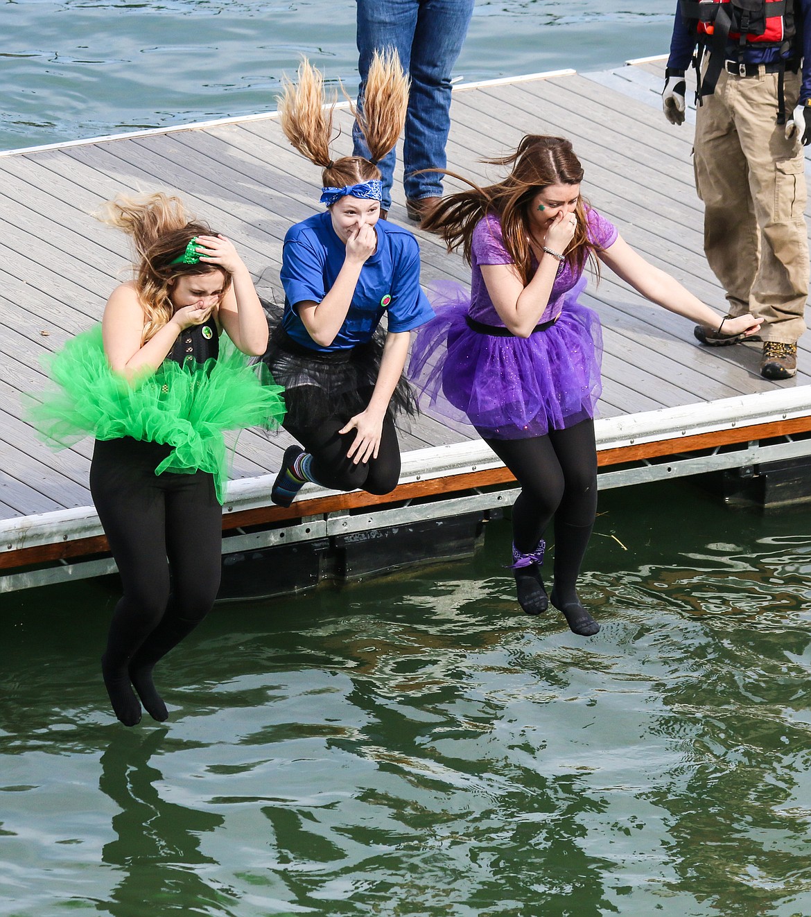 Photo by MANDI BATEMAN
Representing the DYW, the three girls in tutus take the plunge.