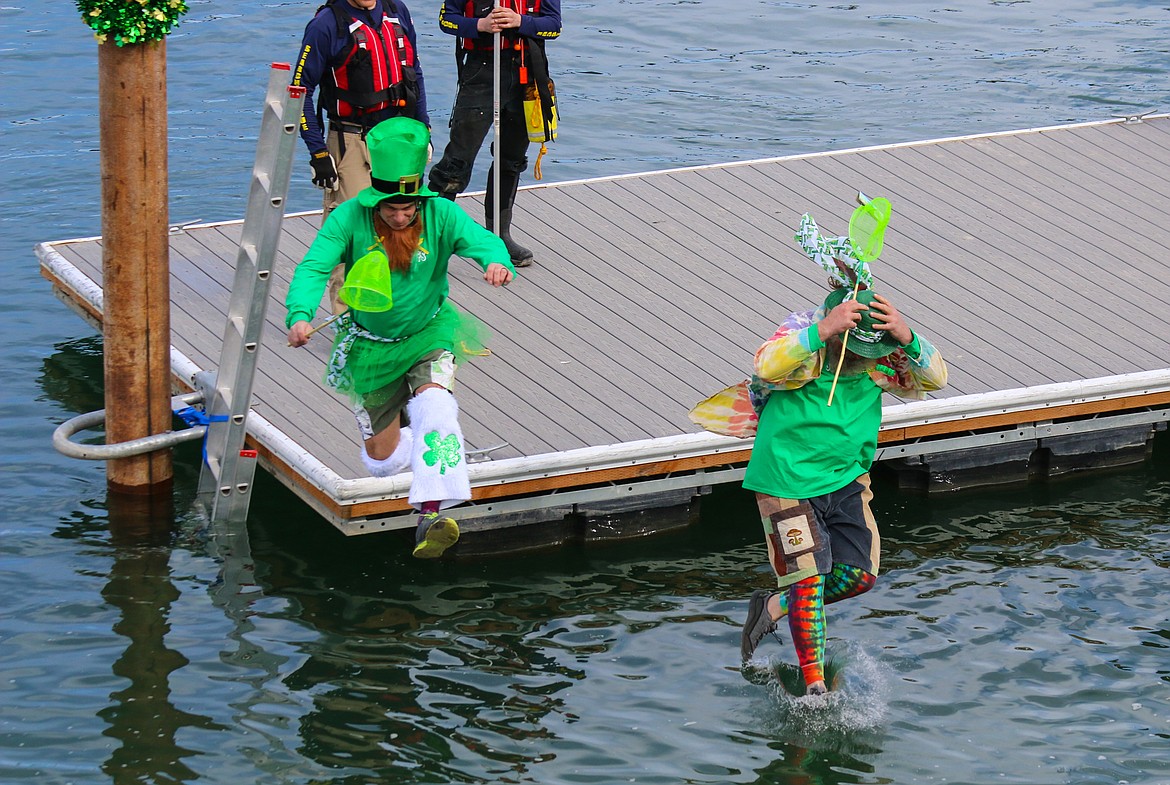 Photo by MANDI BATEMAN
South Boundary Fire Chief Tony Rohrwasser and South Boundary Firefighter Michael Powers take the plunge in full costume.