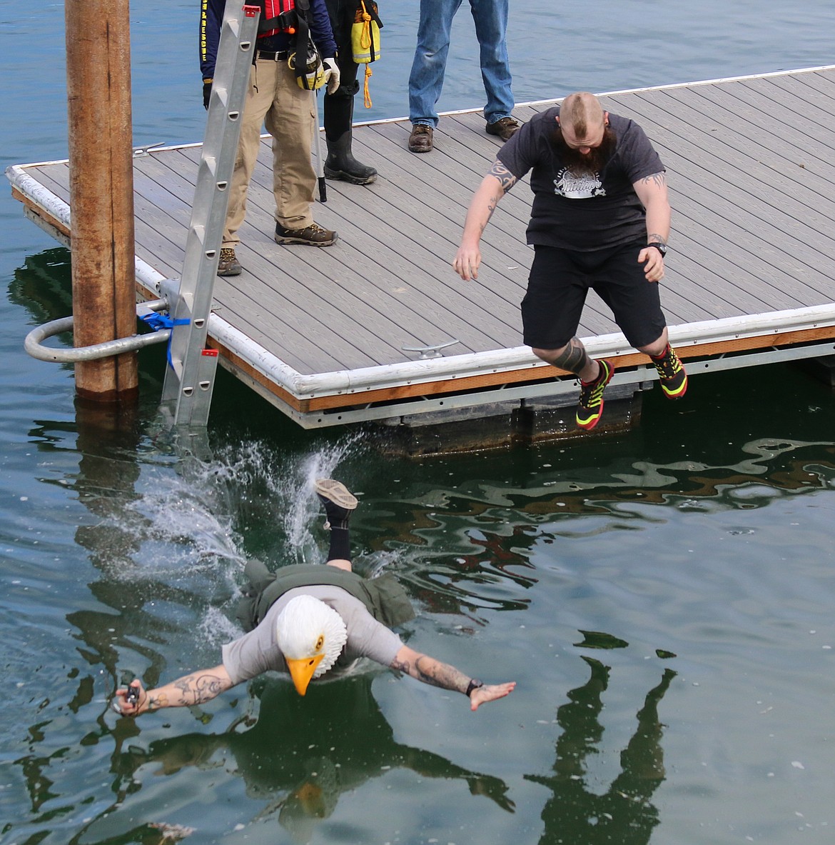 Photo by MANDI BATEMAN
Tom Chaney in the eagle mask, and CJ McVeigh, were the first to jump.