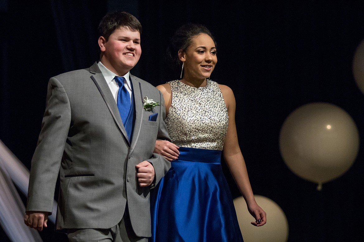 Libby Senior Blake LaCoss, left, and Olivia Gilliam-Smith participate in the Grand March at Libby Prom on Saturday, March 17, 2018. (John Blodgett/The Western News)