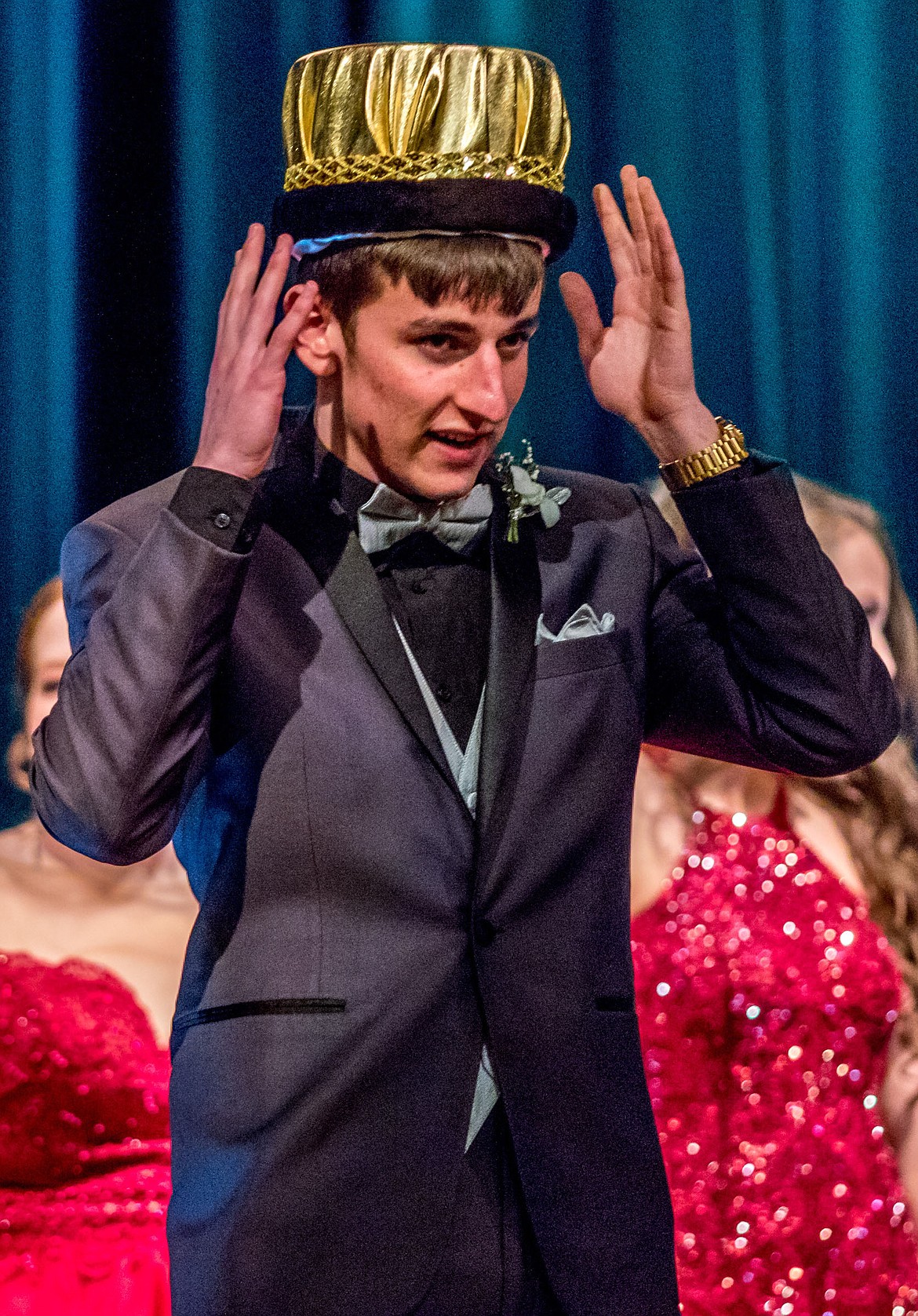 Libby senior Brian Peck puts on the king&#146;s crown at Libby Prom on Saturday, March 17, 2018. (John Blodgett/The Western News)
