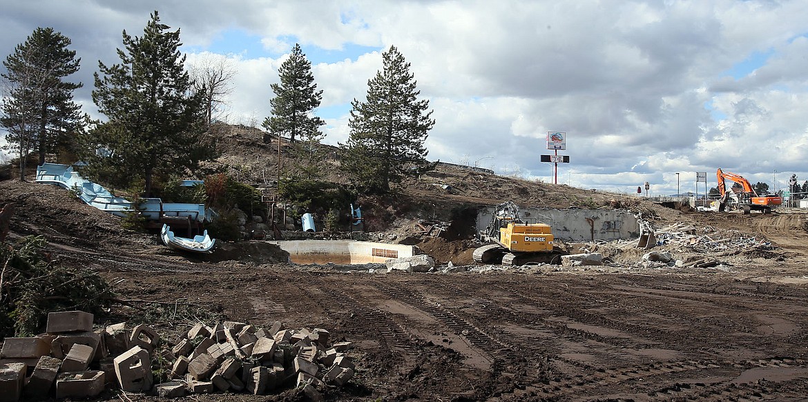The waterslides and the top of the hill at the former Wild Waters waterpark are coming down, said Peck and Peck Excavating owner Greg Peck on Monday.