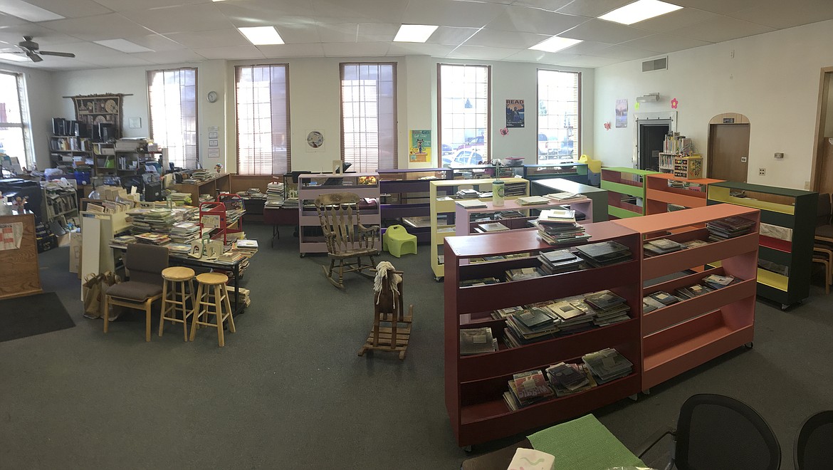 COLORFUL, NEW shelves that were constructed by staff at the Ronan Library District last week are being used for childrens&#146; books. (Ashley Fox/Lake County Leader)