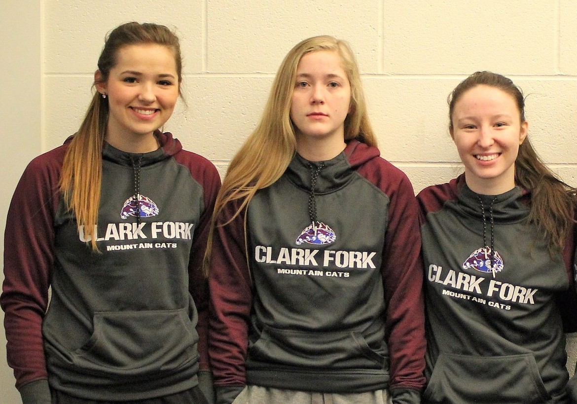Clark Fork Mountain Cats Kenzie Mueller (left), Hailey Kelly and Madison Lommen were named first-team all-conference in District 13C basketball. (Kathleen Woodford/Mineral Independent)