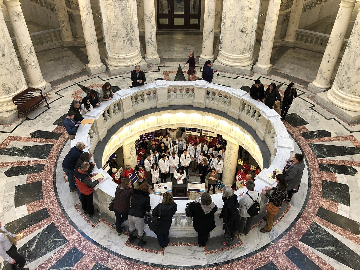 (Photo by KYLE PFANNENSTIEL)
A physician speaking at the &#147;Close the Gap&#148; rally at the Idaho State Capitol Thursday.