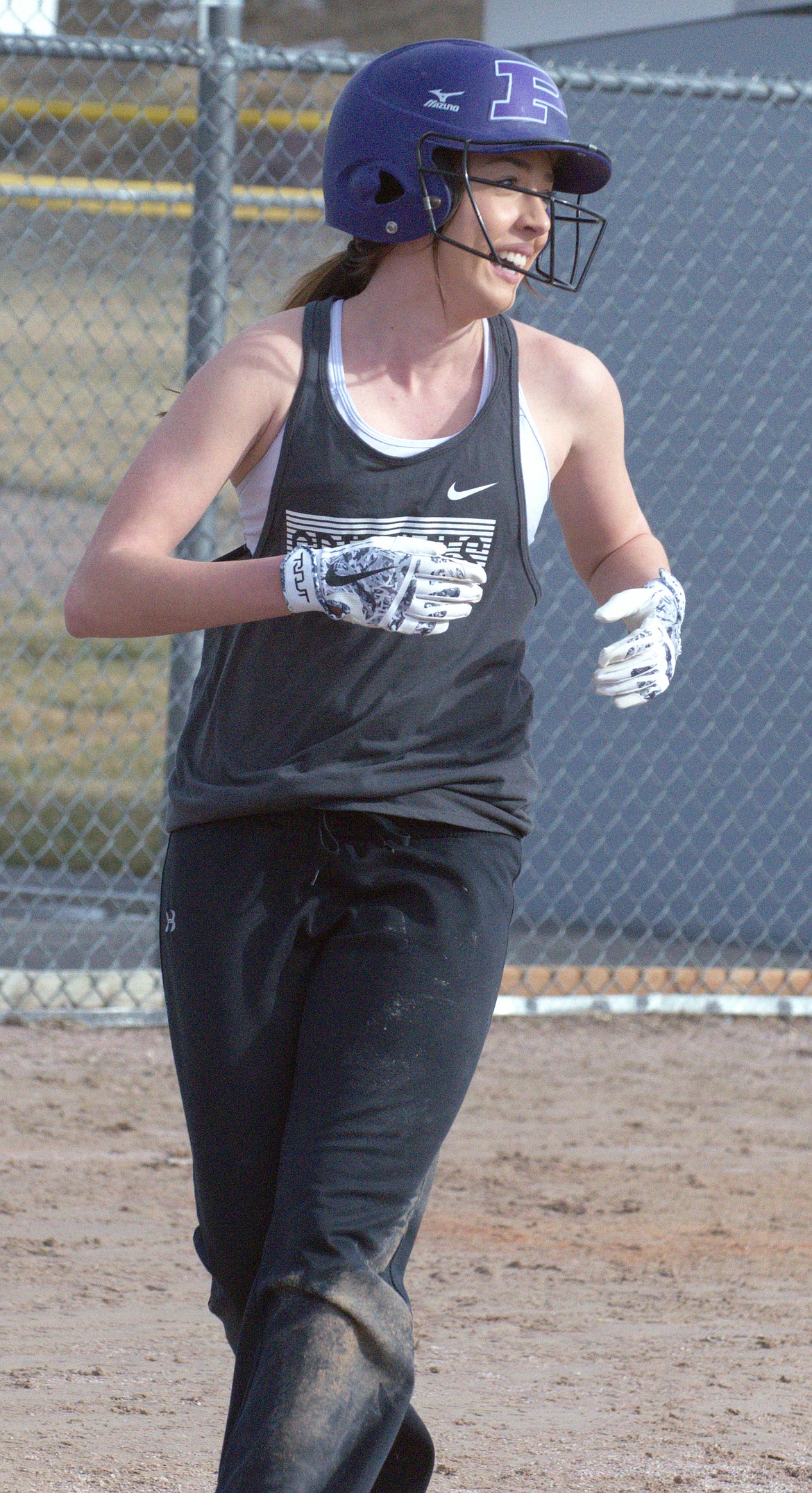 POLSON KAELYN SMITH celebrates after scoring a run during Friday afternoon&#146;s practice at Polson High School softball fields. (Jason Blasco/Lake County Leader)