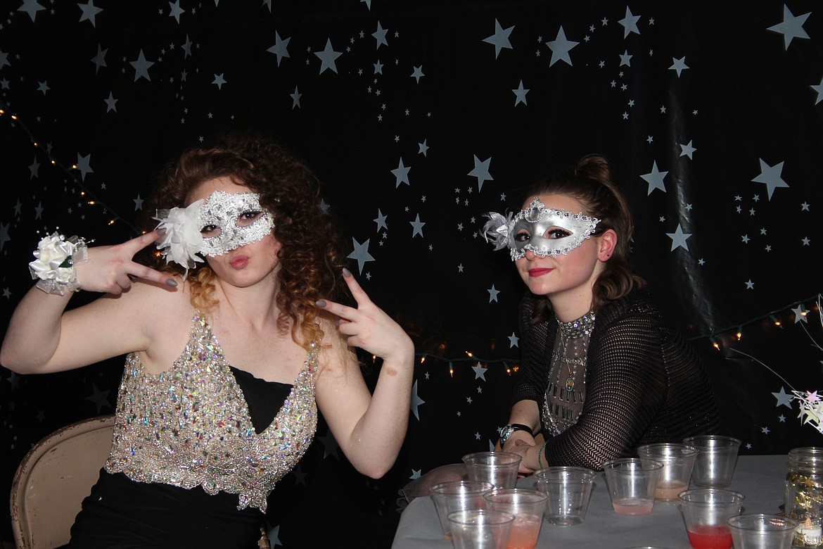 Masked dancers at Superior’s Prom add some mystery to the evening’s event held on Saturday, March 17. (Photo by Frankie Kelly)
