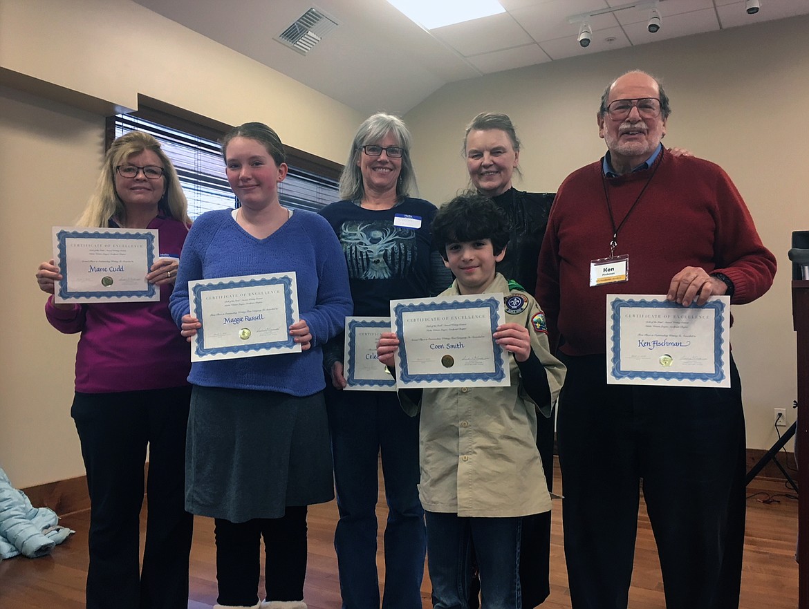 (Courtesy photo)
Winners of the March 17 &#147;Luck of the Irish&#148; annual writing contest co-sponsored by the Sandpoint Chapter of the Idaho Writers League and the East Bonner County Library, were, (from left) Mame Cudd, second place adult category; Maggie Russell, certificate in teen category; Celeste Lawrence, third place adult category;(front) Coen Smith, certificate in teen category; Kathleen Clayton, current president, Idaho Writers League and co-coordinator of the event; and Ken Fischman, first place, adult category.