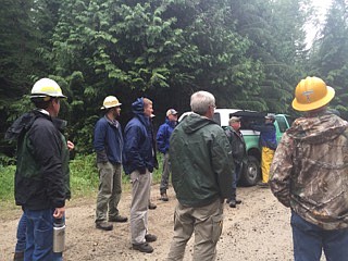 U.S. Forest Service, Idaho Department of Lands and public stakeholders consider project needs at a Hana Flats field trip on July 7, 2016, near Priest River.