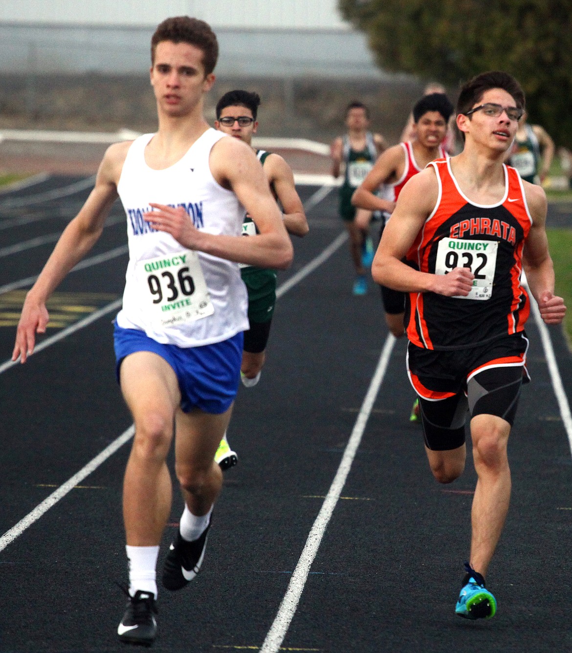 Rodney Harwood/Columbia Basin Herald
Ephrata middle distance runner Jayden Lopez (932) and Billy Simpkin of Kiona-Benton (936) race stride-for-stride to the finish in the 800-meter run on Thursday at the Best of the Basin track and field meet in Quincy. Simpkin edged Lopez for the win.