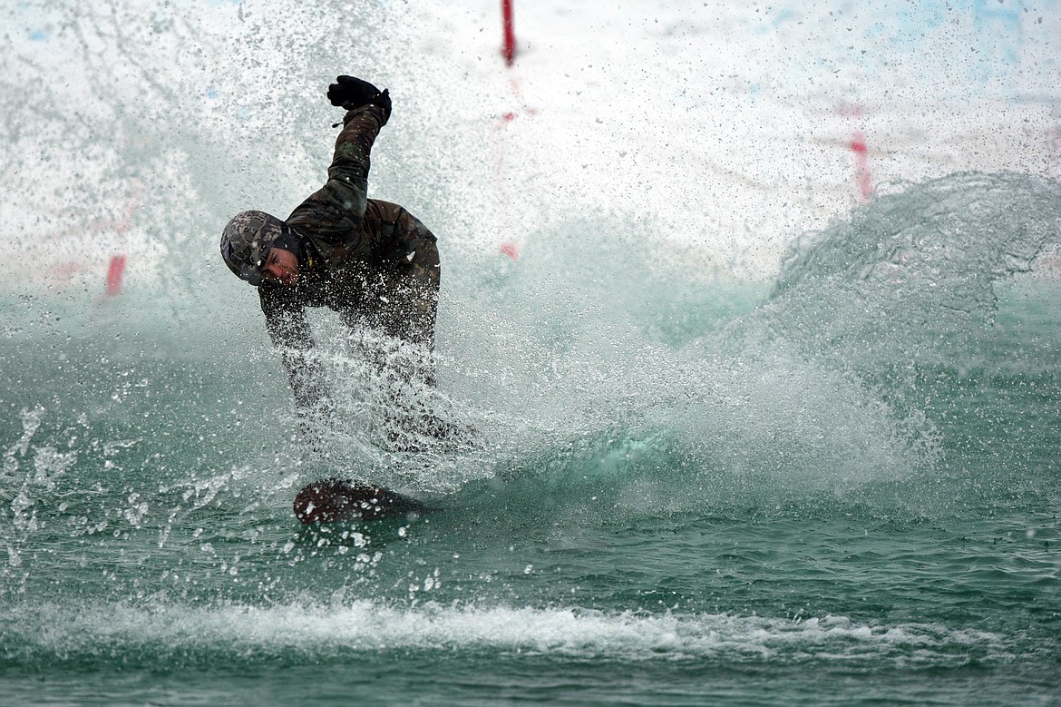 Participants compete in the 2018 Whitefish Pond Skim at Whitefish Mountain Resort on Saturday. (Casey Kreider/Daily Inter Lake)