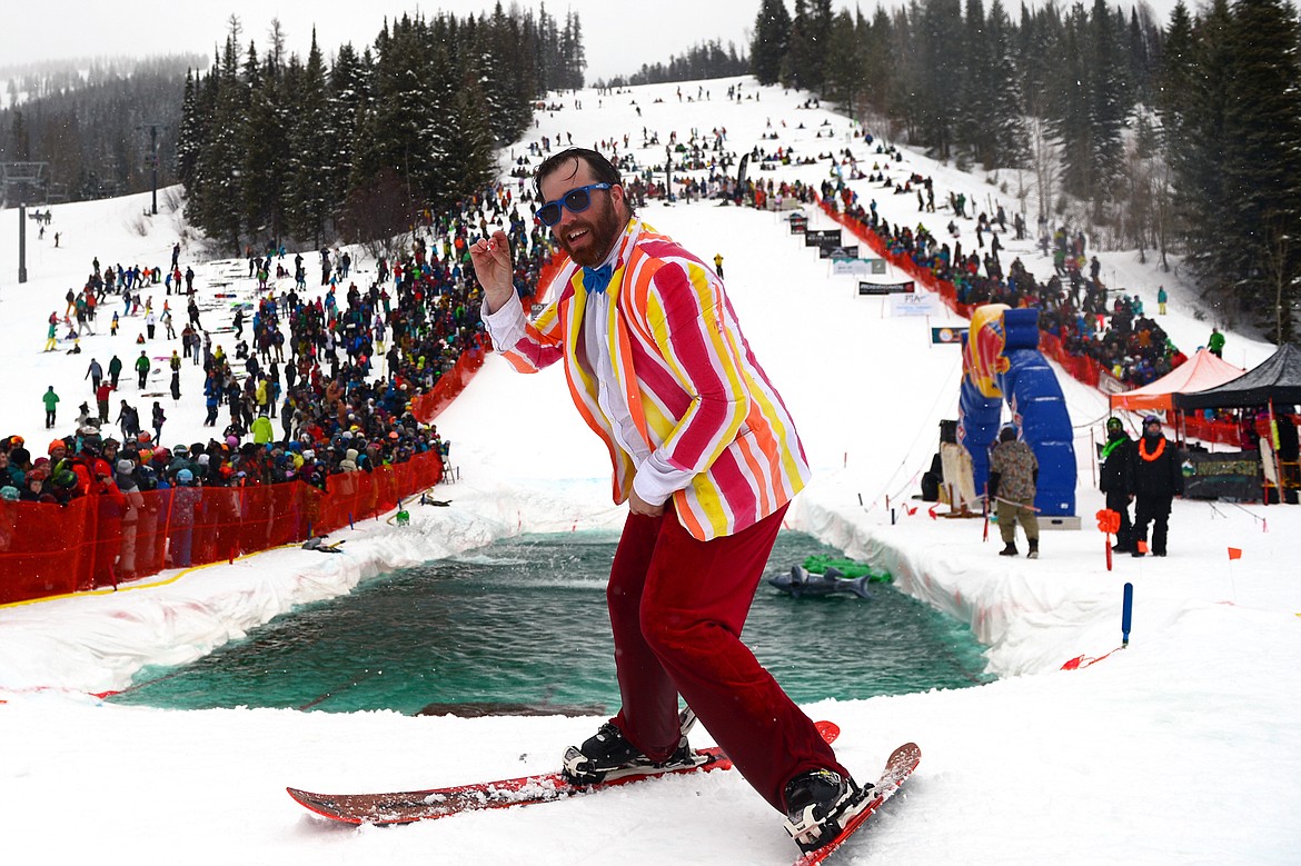 Billy &#147;The Candy Man&#148; Marcial celebrates after a successful trip across the pond at the 2018 Whitefish Pond Skim at Whitefish Mountain Resort on Saturday. (Casey Kreider/Daily Inter Lake)