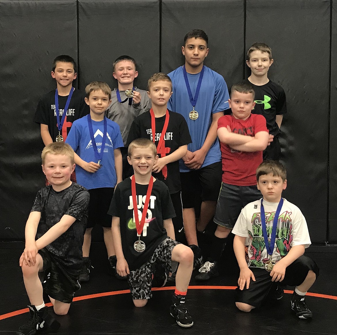 Courtesy photo
Team Real Life wrestlers participated in the Washington Little Guys Wrestling League&#146;s Gonzaga Prep event held March 24. In the front row from left are Parker Stearns, 2nd; Hunter Patzer, 2nd and Jacob Kunzi, 1st; second row from left, Tristen Mendenhall, 1st; Ryker Allen, 2nd and Paxton Purcell, 1st; and back row from left, Benjamin Carrasco, 1st; Trey Smith, 1st; Armando Laguna, 1st and Connor McCarroll, 2nd. Not pictured, but placing: Wyatt Hinderager, 3rd; Jonathan Hansen, 1st; Briley Arnett, 1st and Braxton Jerald, 1st.