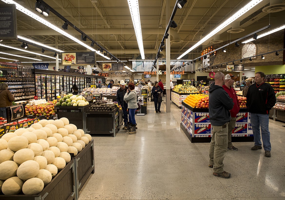 VIP guests walk around the new Super 1 Foods store in Athol. (LOREN BENOIT/Press)