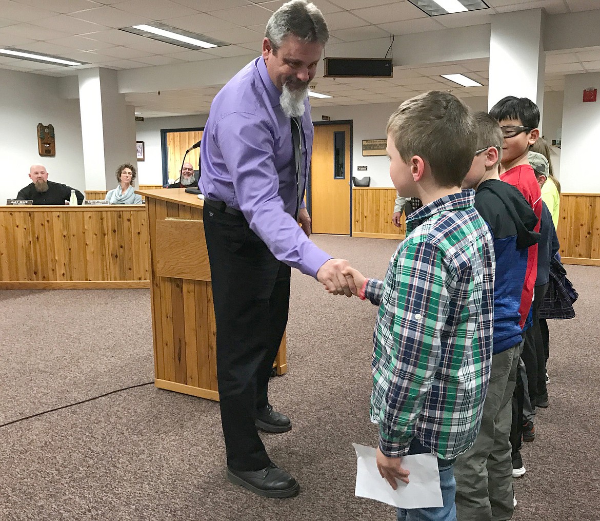Libby Mayor Brent Teske thanks Jack Lampton and seven other kids for attending the April 2 City Council meeting. (John Blodgett/The Western News)